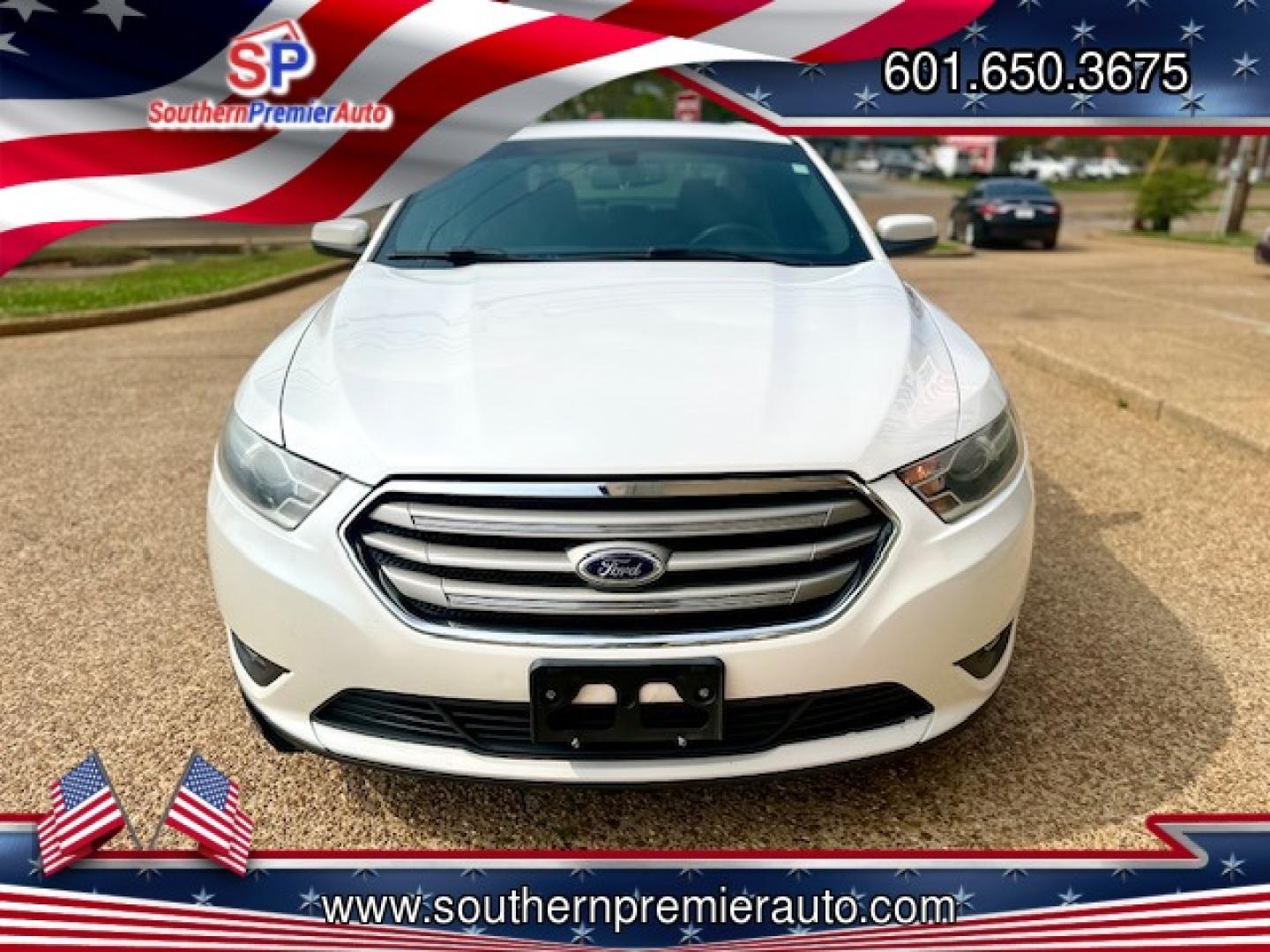 2015 WHITE FORD TAURUS SEL (1FAHP2E86FG) , located at 922 W. Beacon St., Philadelphia, MS, 39350, (601) 650-3675, 32.770447, -89.127151 - Photo#1